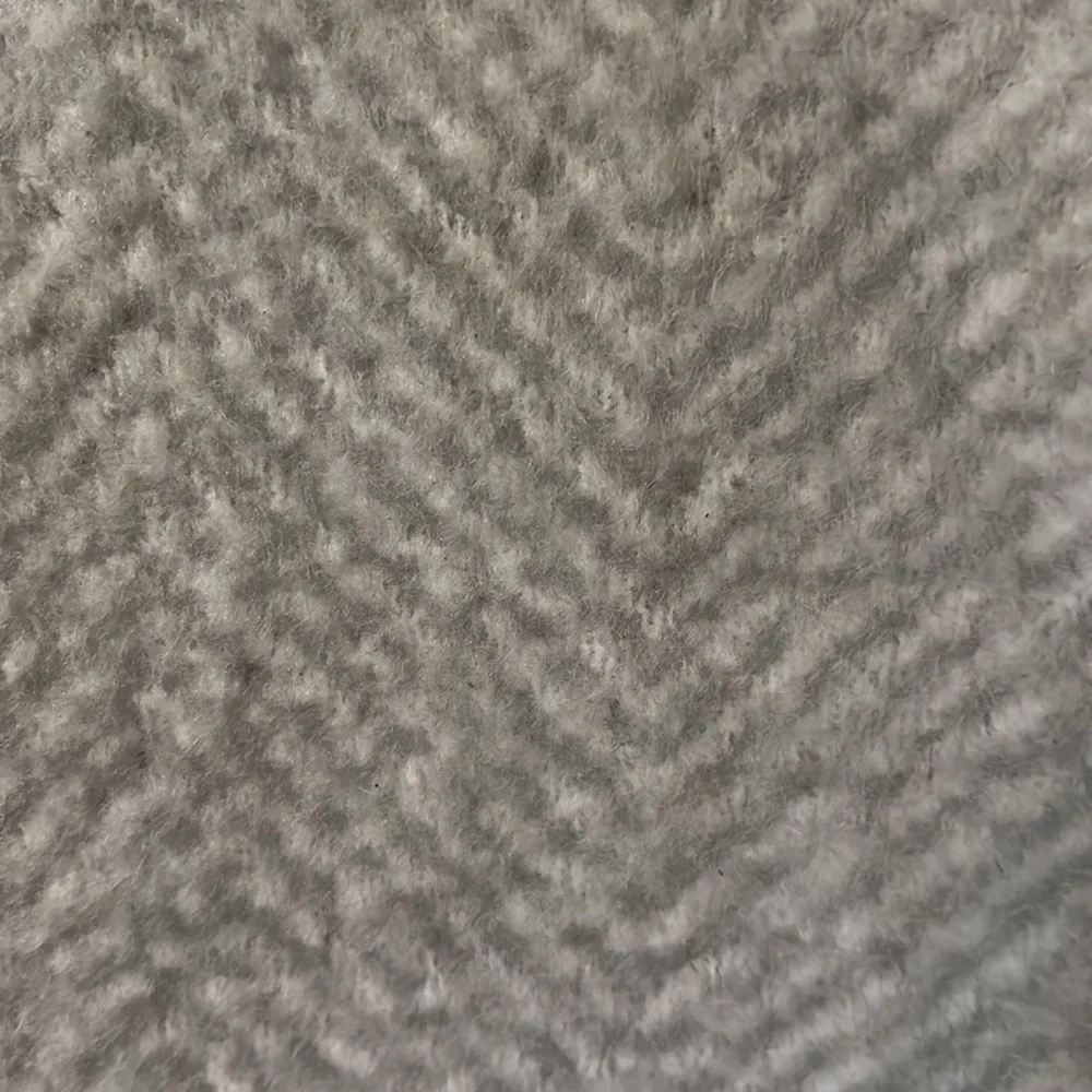 Soft grey and white West Elm throw